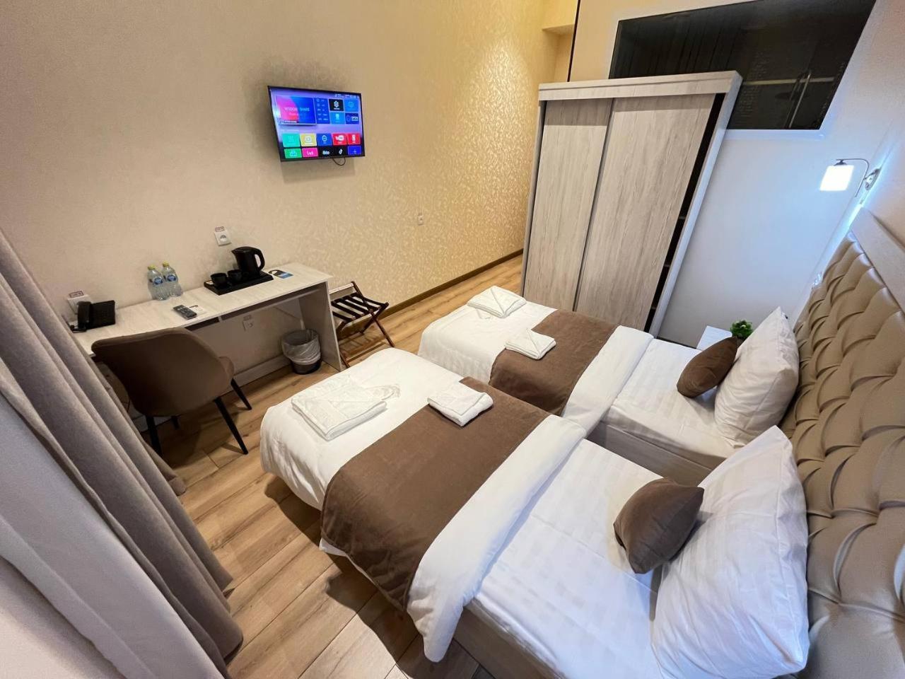 Aks Hotel Tasjkent Buitenkant foto